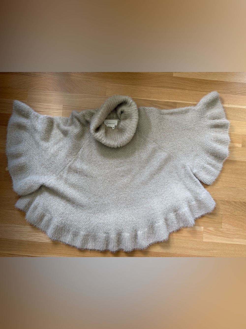 Anthropologie Cream Ruffle Hem Turtleneck Poncho Sweater